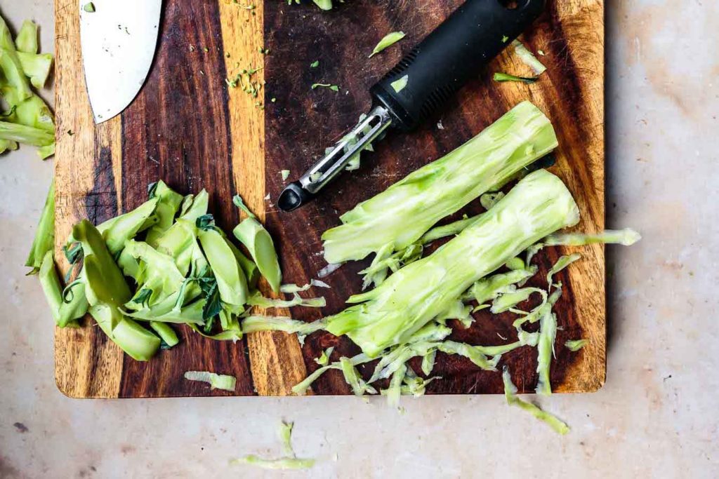 peeling broccoli stalk