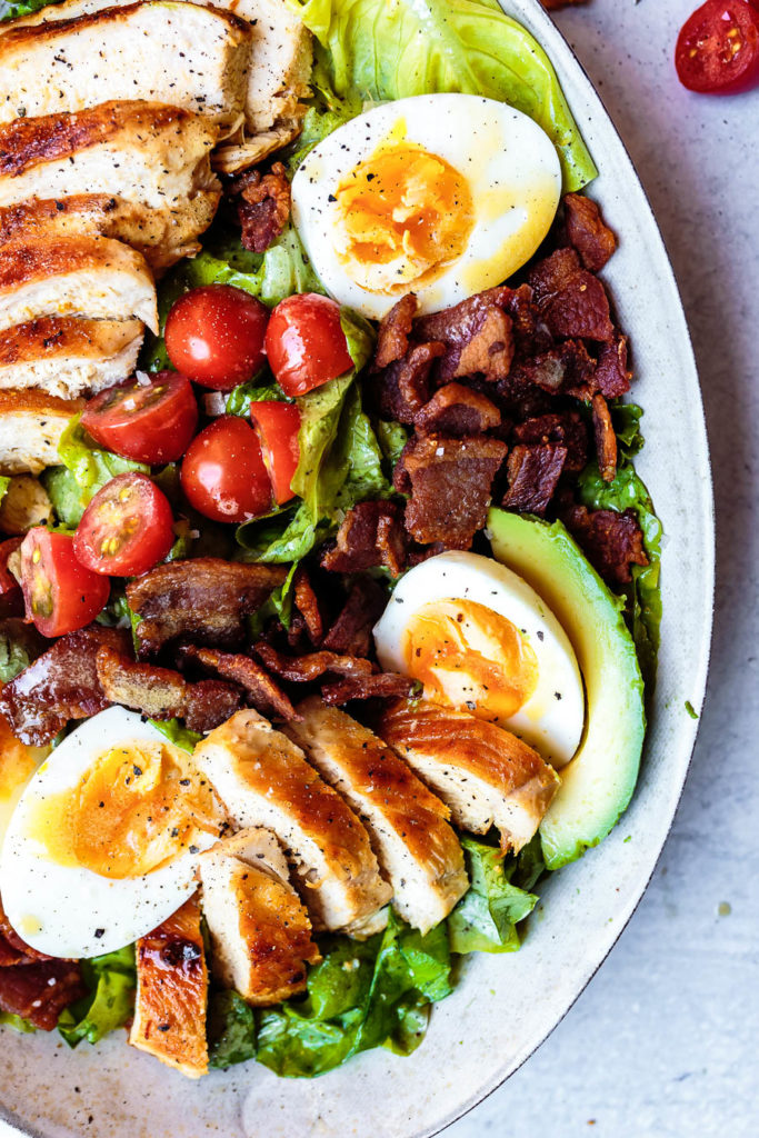 This Paleo Chicken Cobb Salad recipe is a classic summertime meal that turns simple chicken into a delicious, satisfying, and healthy meal.